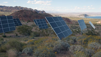 several solar panels in desert